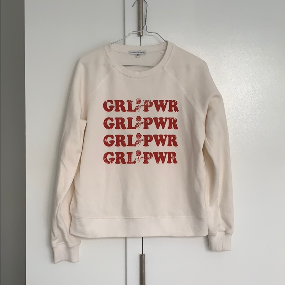 Girlpower! White sweater from Rebecca Minkoff